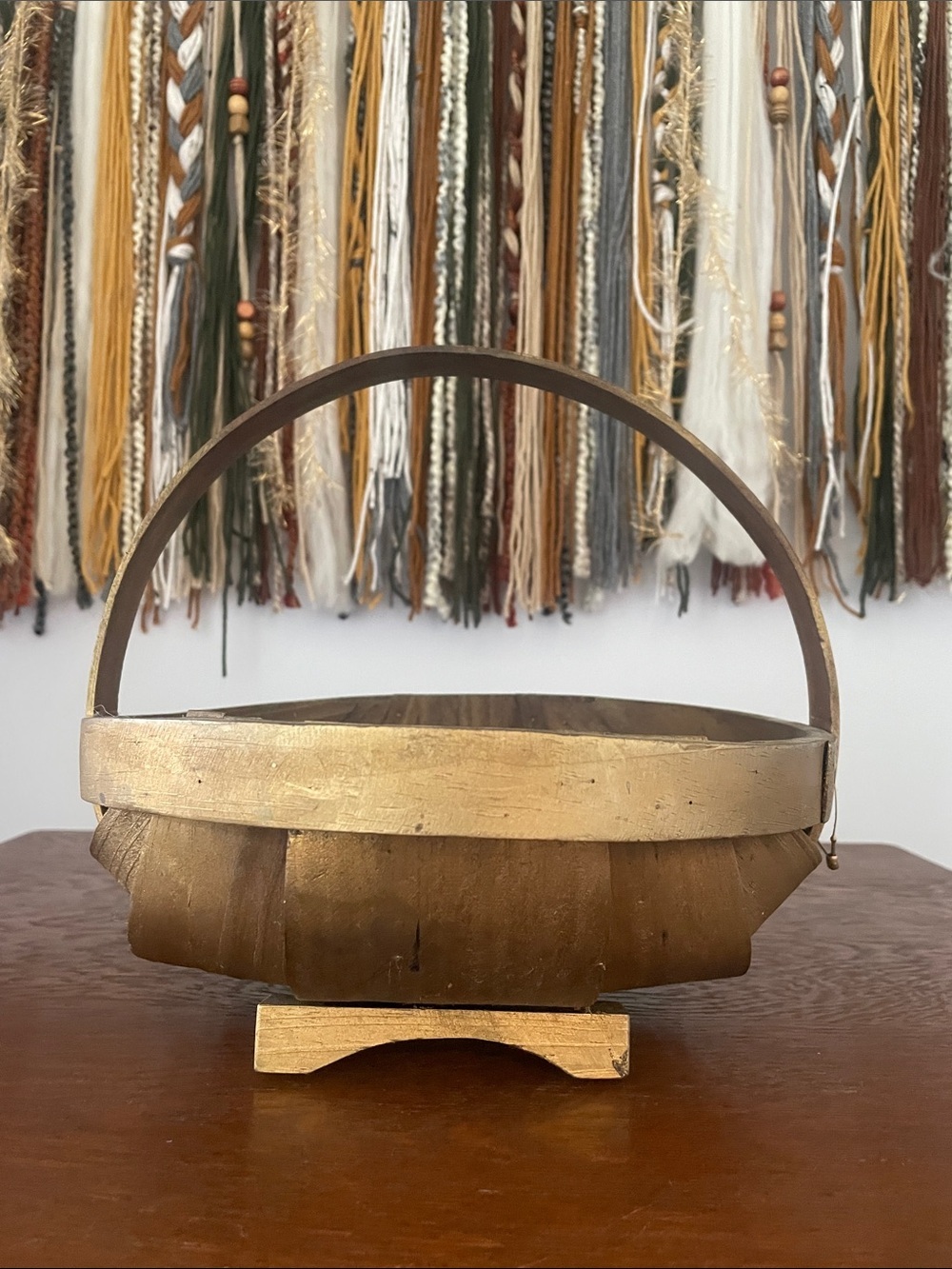 Distressed gold basket with handle